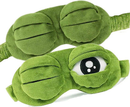 Frog Sleep Mask — a Stylish, Shimmering Sleep Mask Featuring an Adorable "Sad Frog" Design. This Fun, Plush Eye Mask Is Perfect for Travel, Yoga, Napping, and Light-Blocking; Its Soft Cotton Lining Gently Cares for Sensitive Skin.